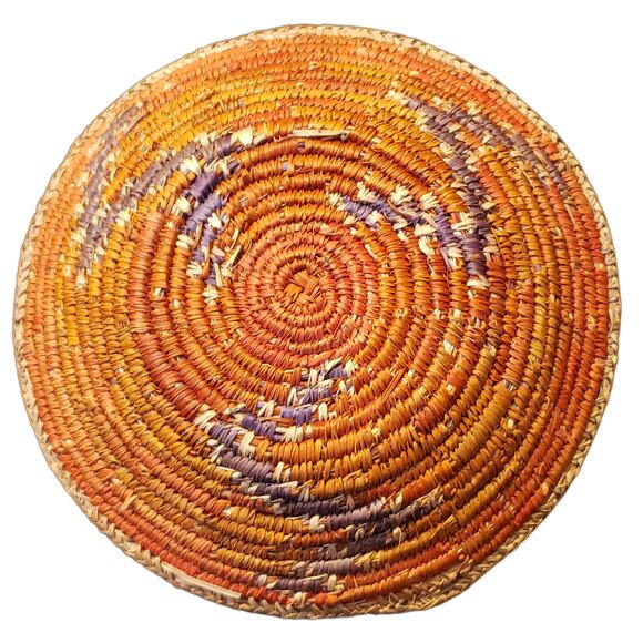 Artisanal Charm: Handwoven Grass Basket with Red and Blue Accents - Picture 2 of 2